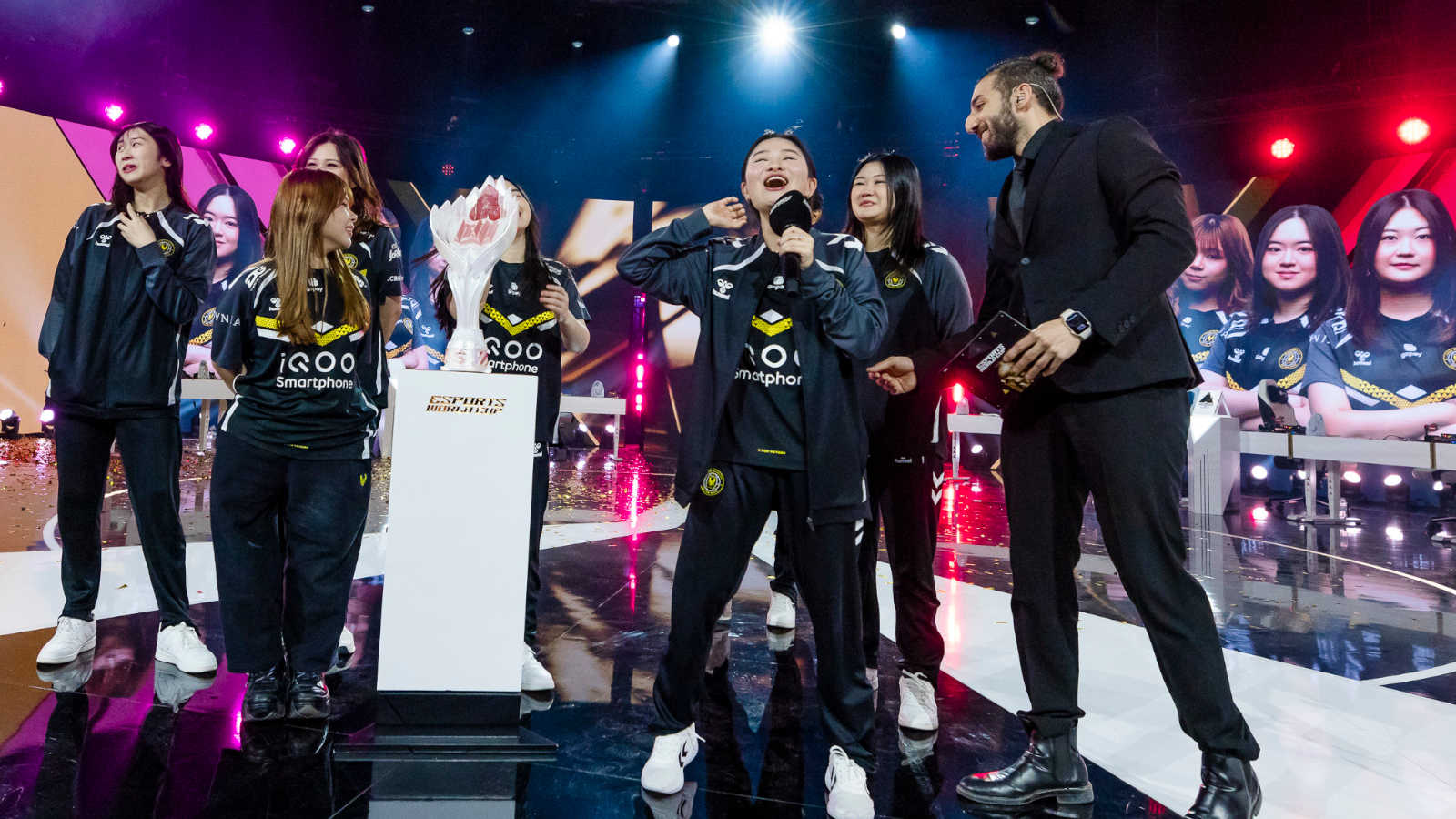 Team Vitality celebrate their trophy win at the MLBB Women's Invitational during the 2025 Esports World Cup