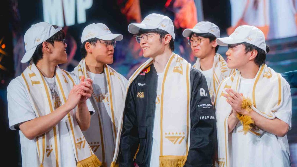 T1 Oner, Gumayusi, Keria, Faker, and Doran celebrate onstage after being crowned champions at League of Legends Worlds 2025 Finals on November 08, 2025 in Chengdu, China. (Photo by Colin Young-Wolff/Riot Games)