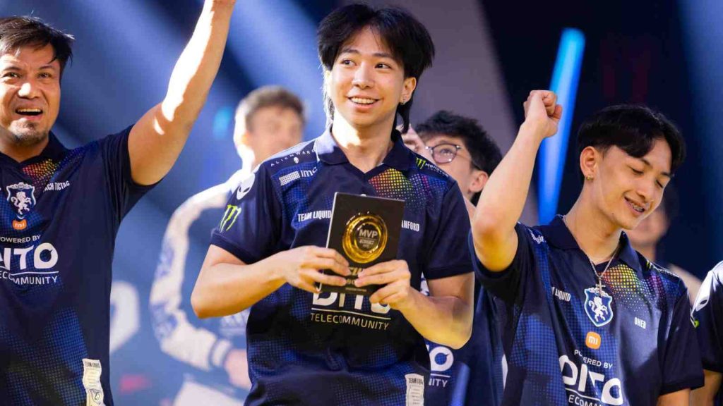 Team Liquid Philippines' Sanford holds up the MVP plaque after putting in an irrepressible performance in the Grand Finals
