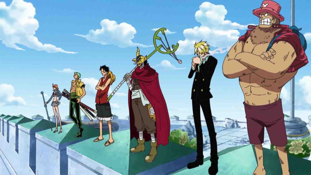 Straw Hats members Nami, Zoro, Luffy, Usopp, Sanji, and Chopper standing atop the courthouse.