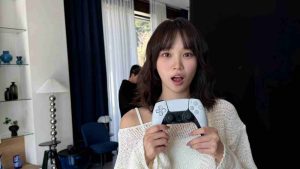 PlayStation x Le Sserafim collaboration: Kim Chaewon holds a PlayStation controller