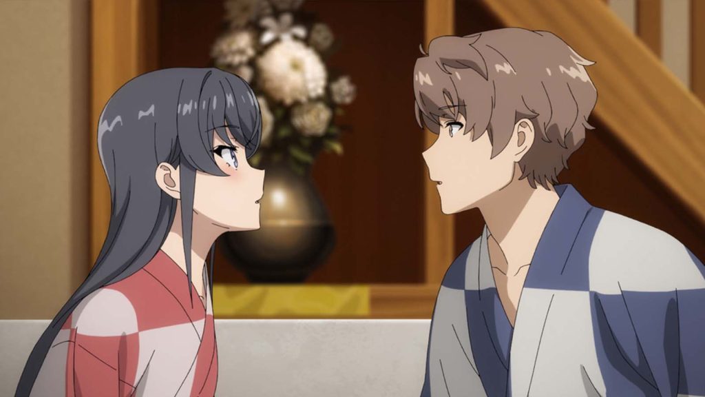 Mai Sakurajima and Sakuta Azusagawa in checkered red and blue kimonos in Rascal Does Not Dream of Santa Claus anime.