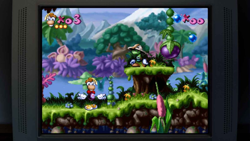 A screenshot of the original Rayman video game displayed on an old-school CRT television. The scene takes place in the Dream Forest, the game's first world.