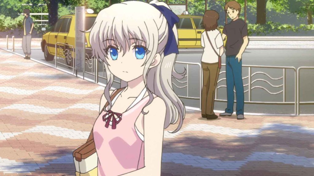 Charlotte anime protagonist Nao Tomori wearing a pink top.