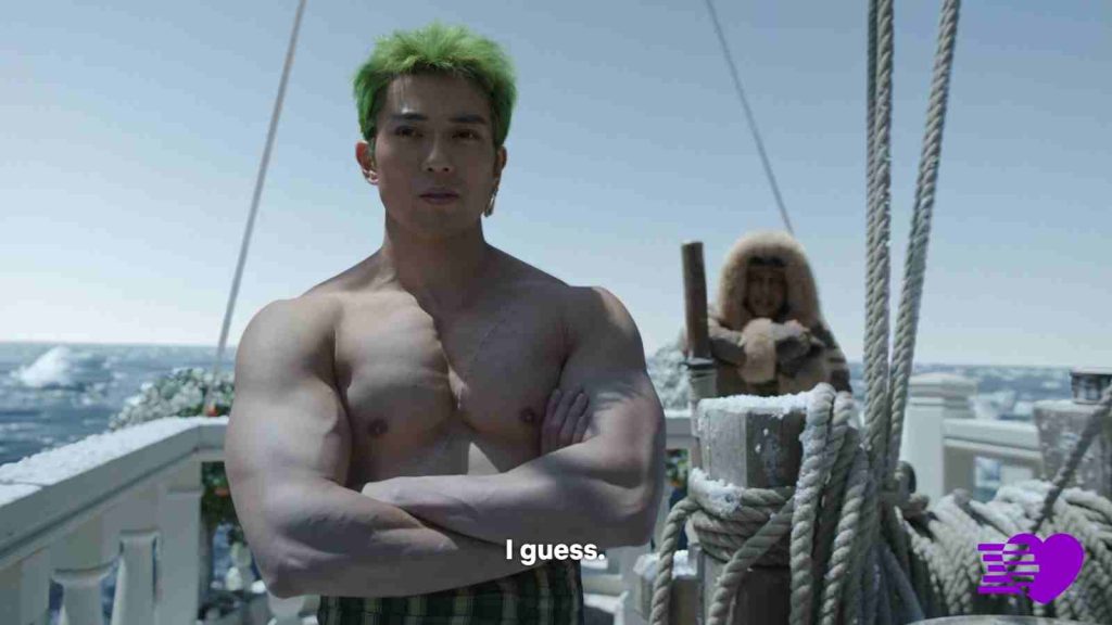 Japanese actor Mackenyu stands with arms folded, showing off Zoro's body in One Piece live action Season 2 Episode 6
