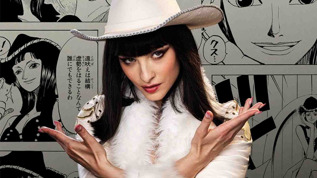 Miss All Sunday actress Lera Abova in the One Piece live action season 2 poster, showing Nico Robin's manga panels in the background.