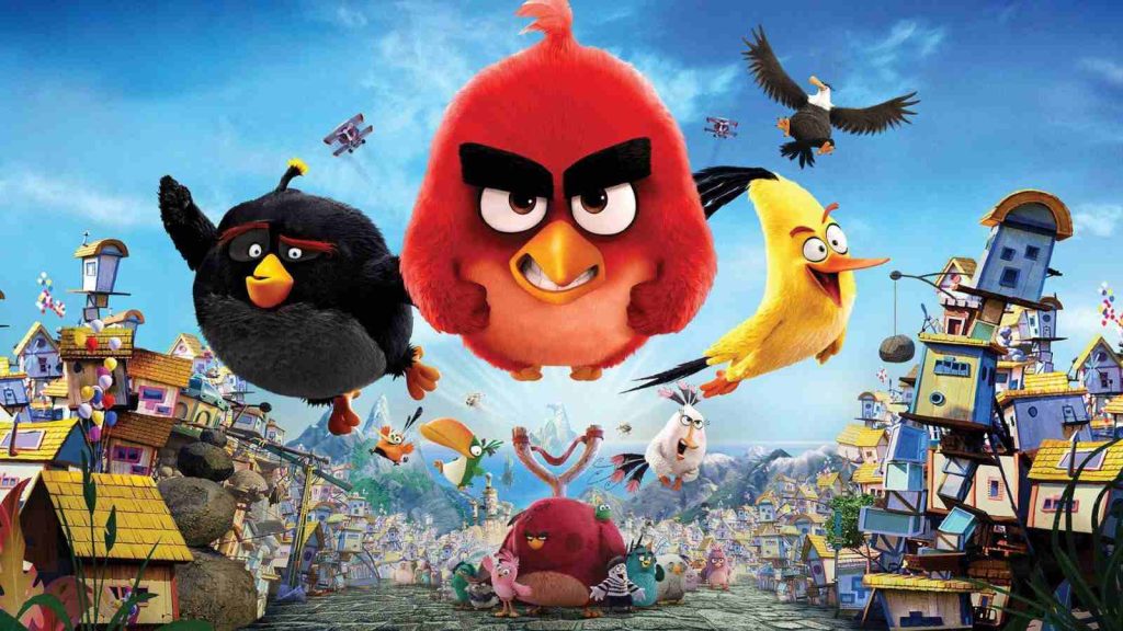 Bomb, Red, and Chuck soaring through the sky in Angry Birds Movie key visual