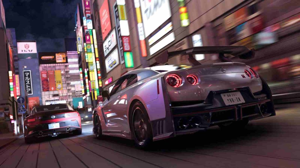 Forza Horizon 6 showing cars driving through a city in Japan official screenshot