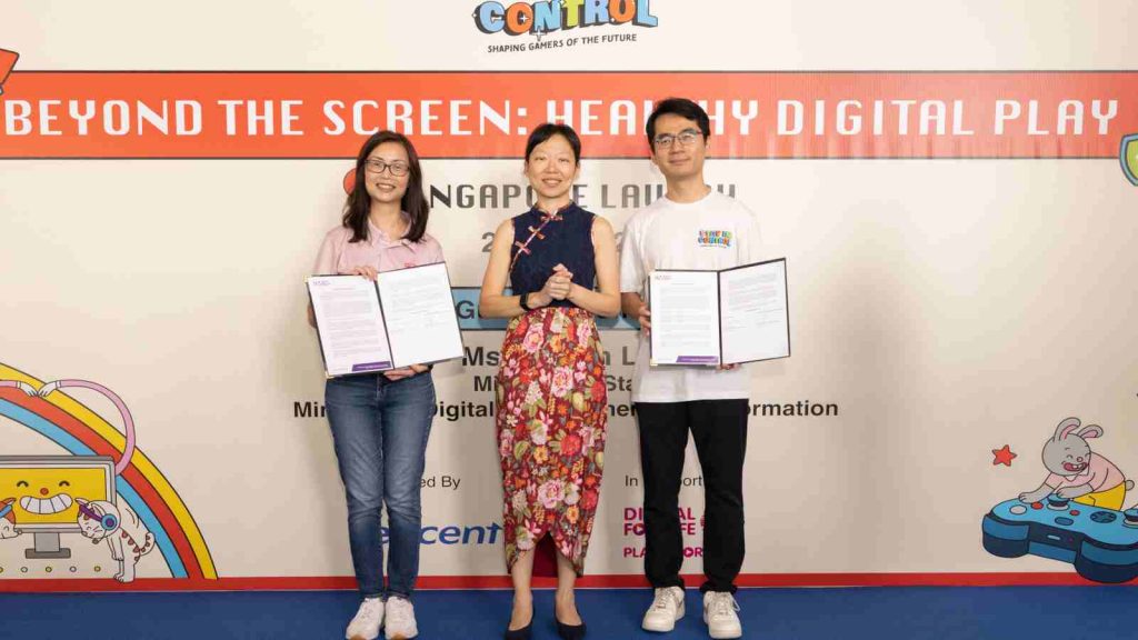 IMDA and Tencent signing an agreement to expand digital wellbeing efforts across Singapore at Healthy Digital Play event