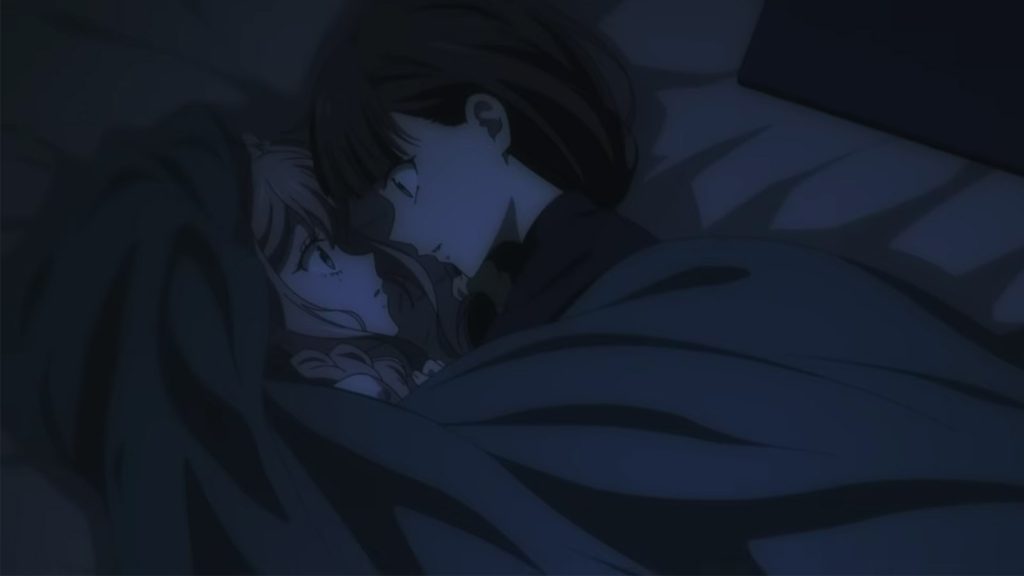 A screenshot from the Young Ladies Don't Play Fighting Games teaser PV showing Mio Yorue and Aya Mitsuki huddled together, lying down in the dark.