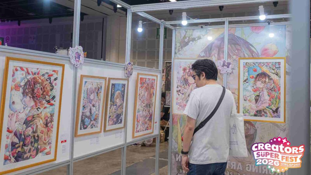 AFA CSF 2026 attendee browsing at Japanese artist Yukoring's exhibition 