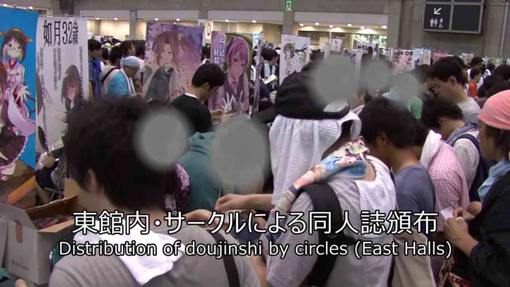 Attendees at Comiket Japan receiving copies of doujinshi distributed by circles.