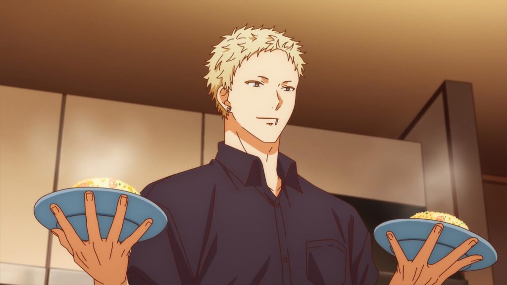 Akihiko Kaji holding two plates of rice in Given the Movie: To the Sea.