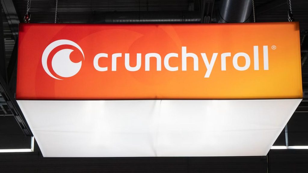 The Crunchyroll logo and text printed on a lit sign.