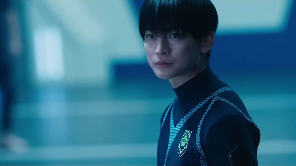 A close-up shot of Yoichi Isagi actor Fumiya Takahashi in the Blue Lock live action movie trailer.